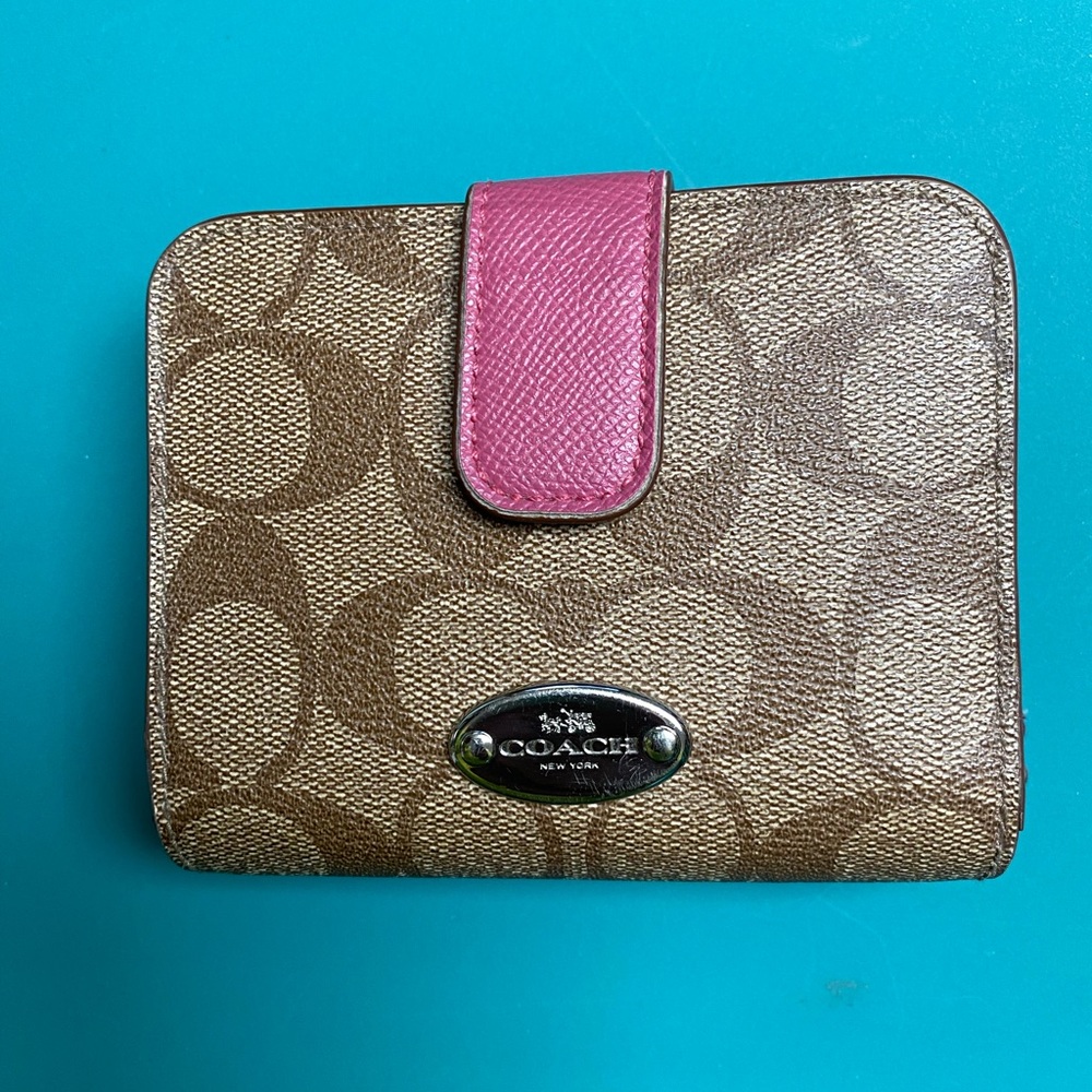 Coach khaki/pink saddle wallet.